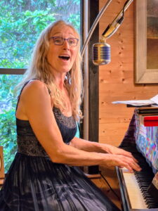 Rachel singing at her In Home Birthday Concert